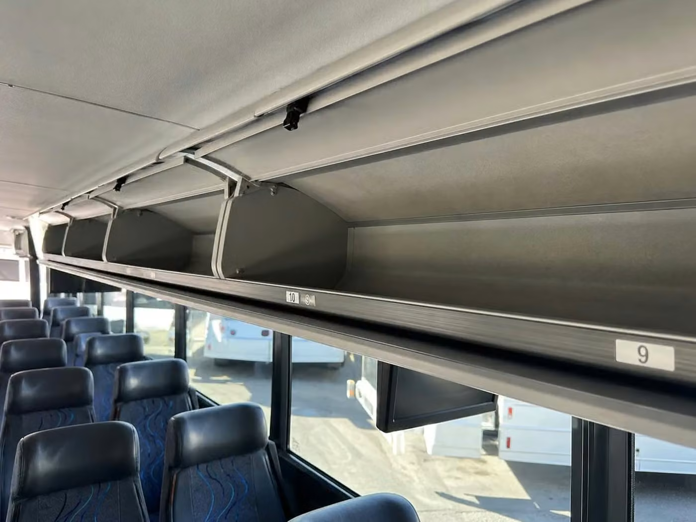 jefferson city 56 passenger charter bus overhead storage